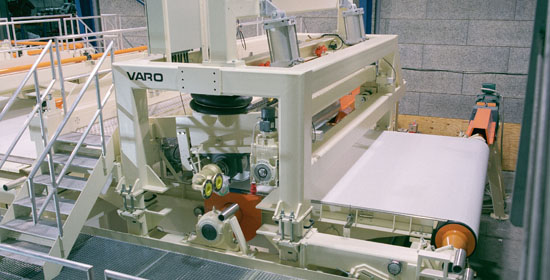 Airlaid, hot-roll compaction system Heißwalzen-Verdichtungssystem