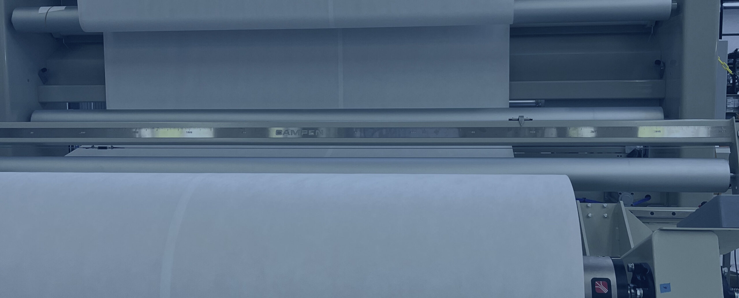 Industrial winder and slitter machinery for nonwovens and technical textiles